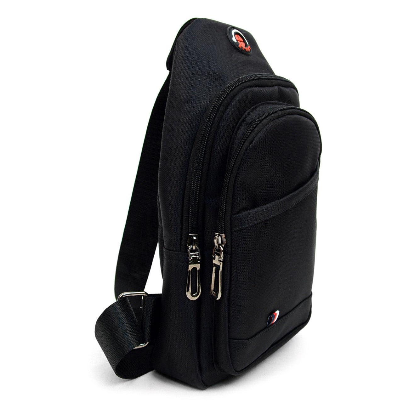Black nylon crossbody sling bag with silver zippers and a red logo patch for hands-free convenience