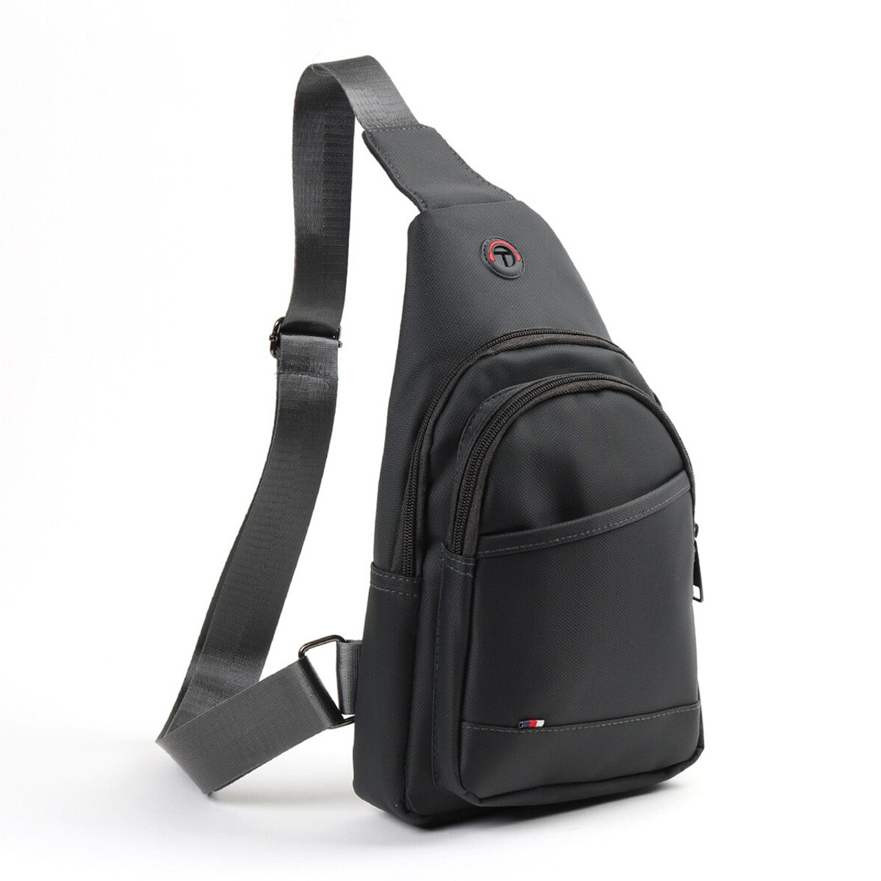 Black nylon crossbody sling bag with sleek minimalist design and subtle red logo accent for everyday use