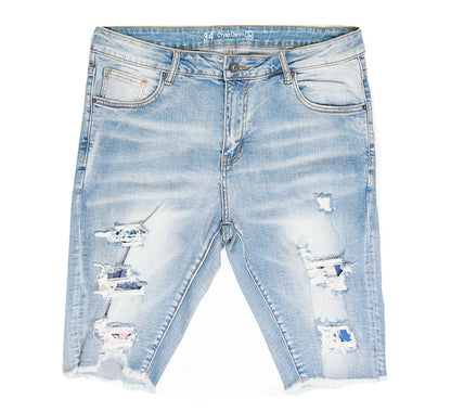 Light-wash CRYSP denim cut off short with distressed ripped details and frayed hems made from denim material