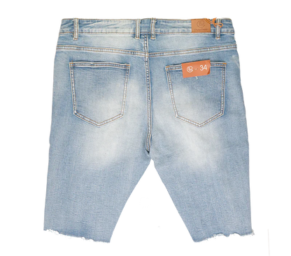 Crysp denim cut off short light-wash denim shorts with frayed hem and orange brand tags front view