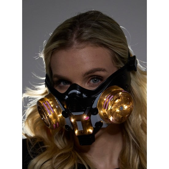 Cyberpunk light up mask black and gold futuristic gas mask with glowing pink accents on circular filters