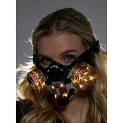 Cyberpunk light up mask black and gold futuristic gas mask with glowing pink accents on circular filters