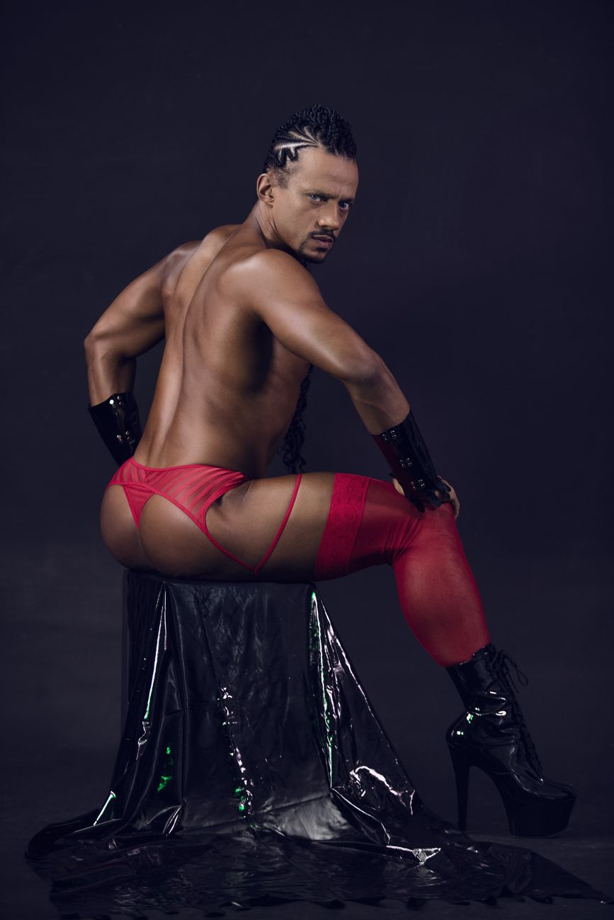 Red latex mesh garter thongs with matching arm cuffs and black high-heeled boots in candyMan 99792 color red