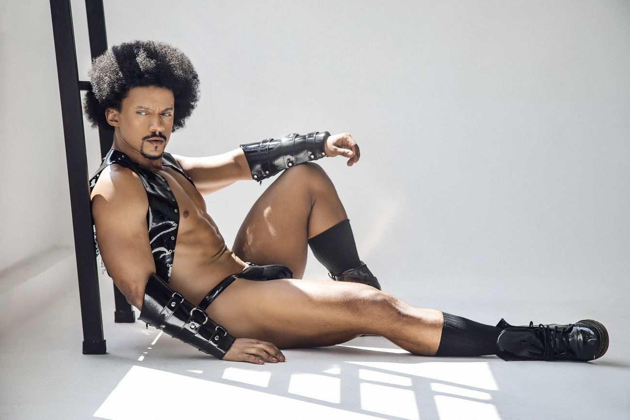 Black leather arm and leg bracers with silver hardware from candyman 99819 dom thongs gloss black collection