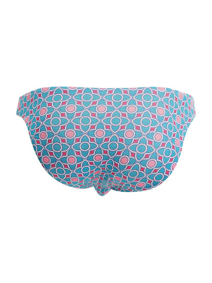 A pair of turquoise and pink geometric patterned candyMan 99923 briefs with white outlines in blue color