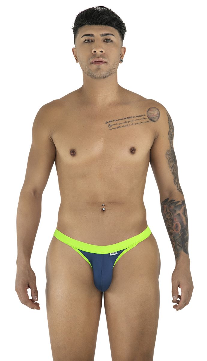 Model wearing CandyMan 99941 navy bikini with a bright lime green waistband and minimalist cut.