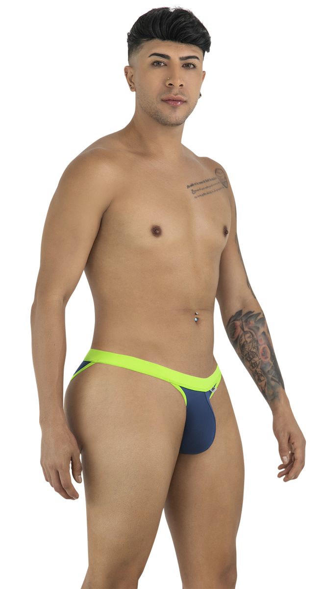 CandyMan 99941 navy bikini with a bright lime green waistband and low-rise cut on a male model.