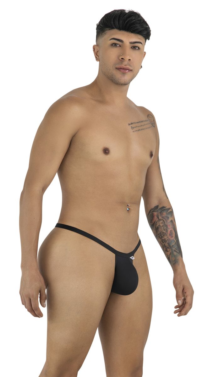 CandyMan 99948 black minimalist thong with a thin waistband and a contoured pouch, modeled on a man.