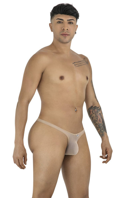 Model wearing CandyMan 99954 beige mesh thong with a minimalist, thin-strap design.