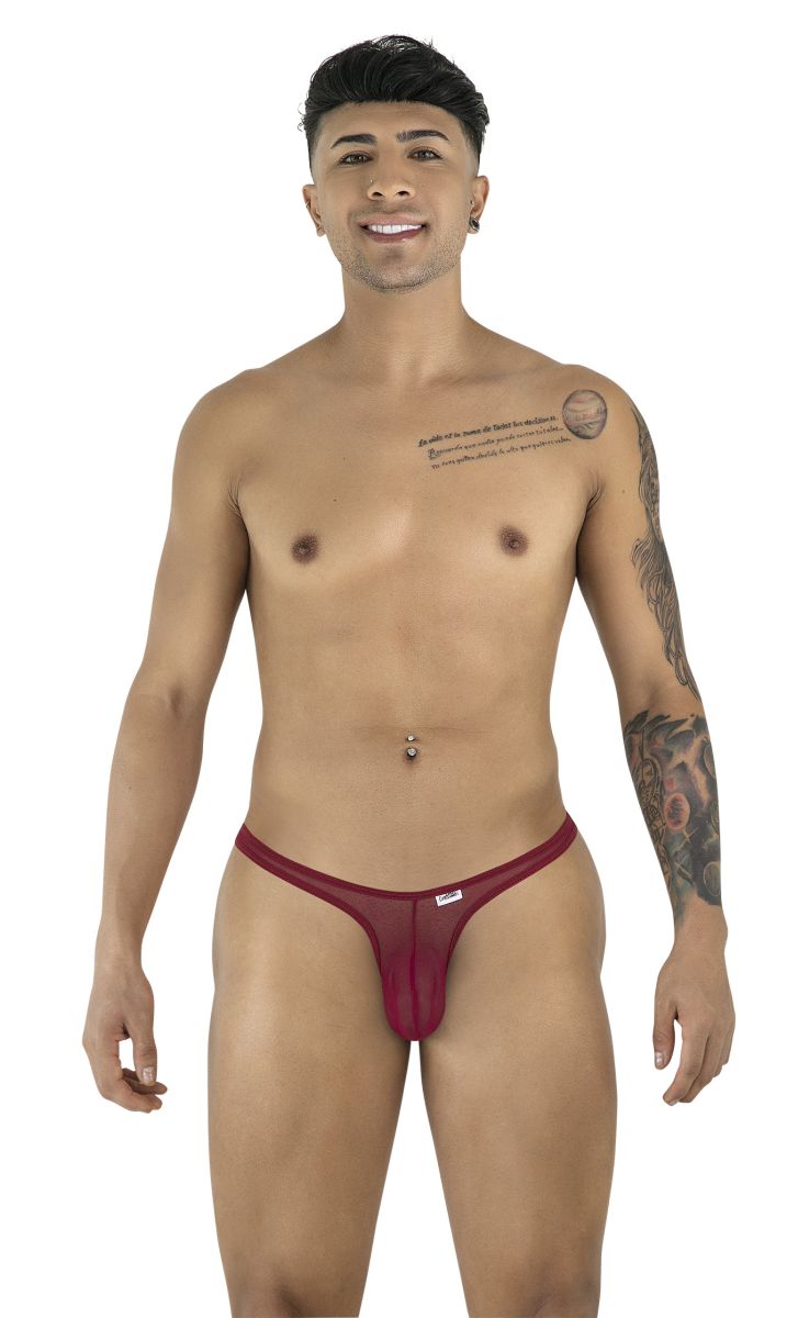 A man wears a burgundy CandyMan mesh thong with a thin waistband and contoured pouch.