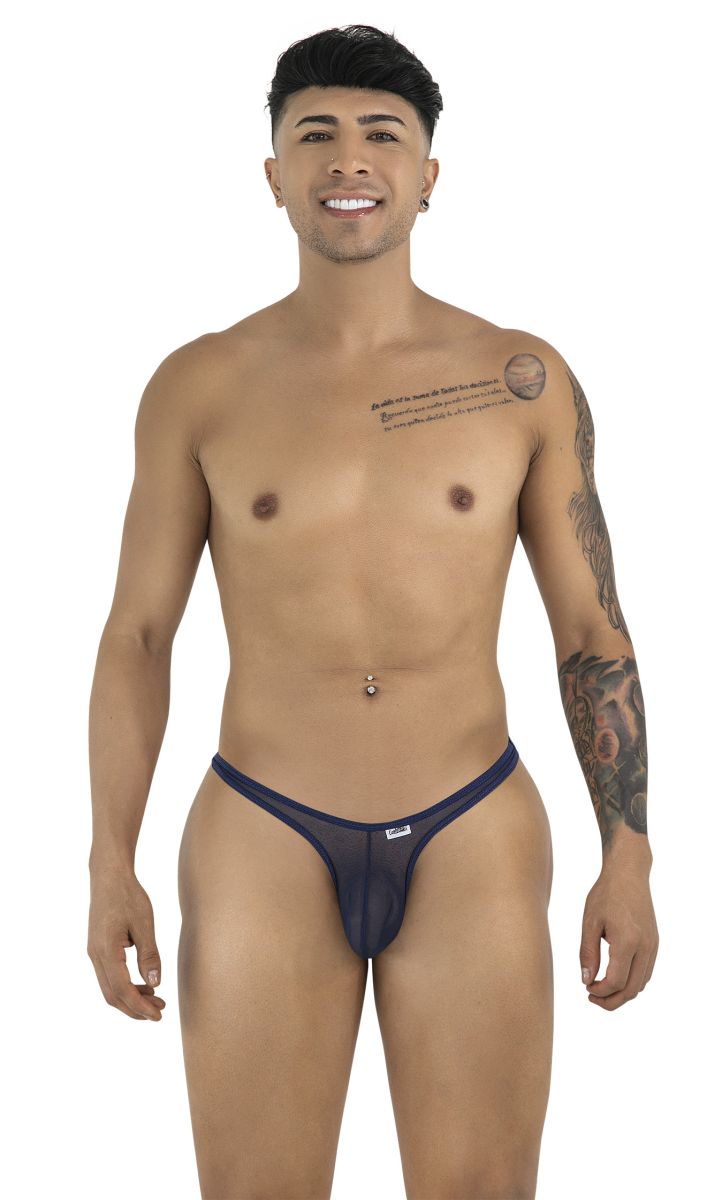 A man models CandyMan navy mesh thongs with a thin double-strap waistband and a minimalist pouch design.
