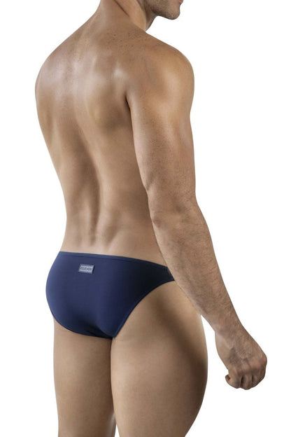 Navy blue clever 1865 oomph bikini men’s briefs shown from the back with a small rectangular brand tag on the waistband