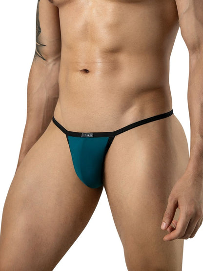 Front view of a man wearing petrol blue briefs with thin black trim and a small logo tag on the waistband.