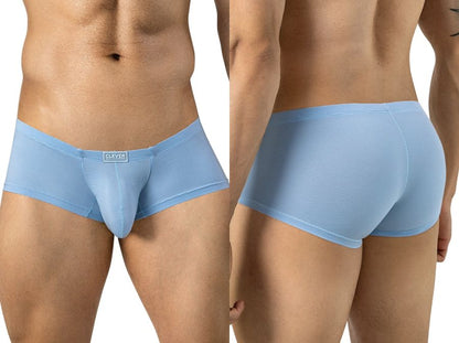 Front and back views of a model wearing light blue ribbed trunks with a small logo tag.