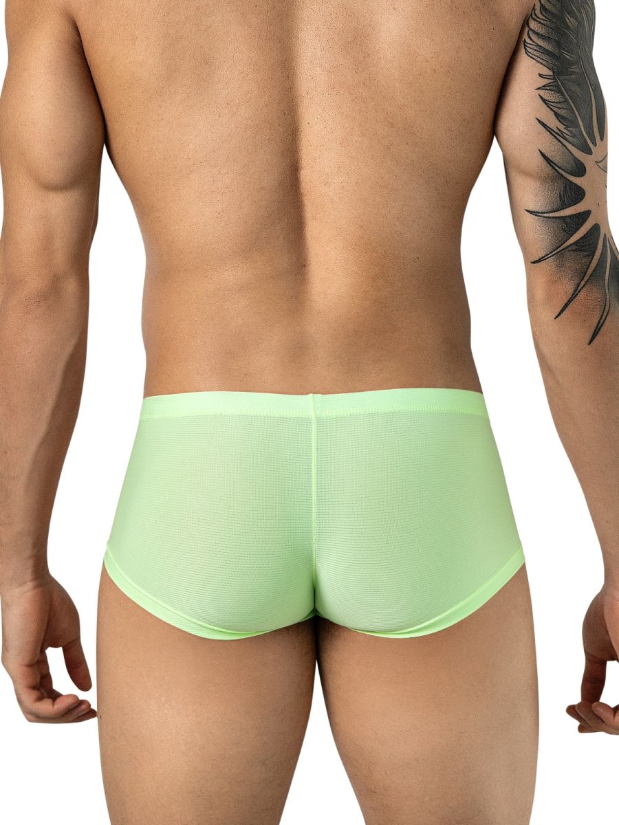 Rear view of a man wearing neon green trunks with a textured mesh fabric.