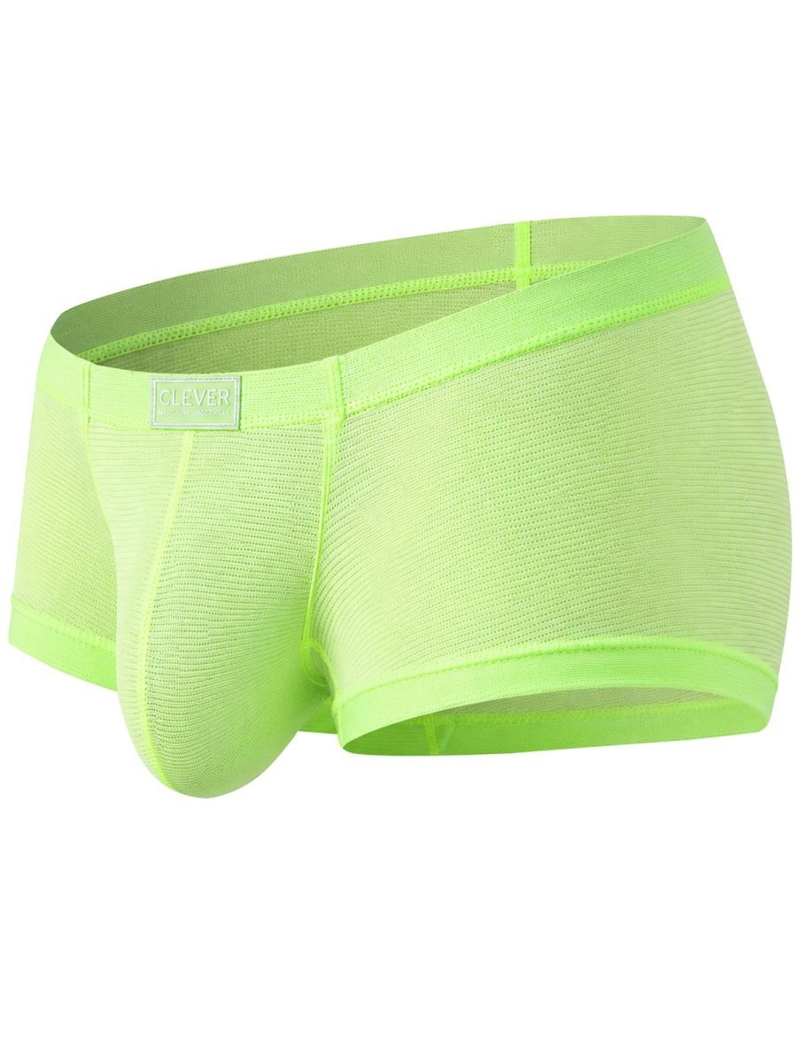 Neon green mesh trunks with a textured knit fabric and a branded label on the front waistband.