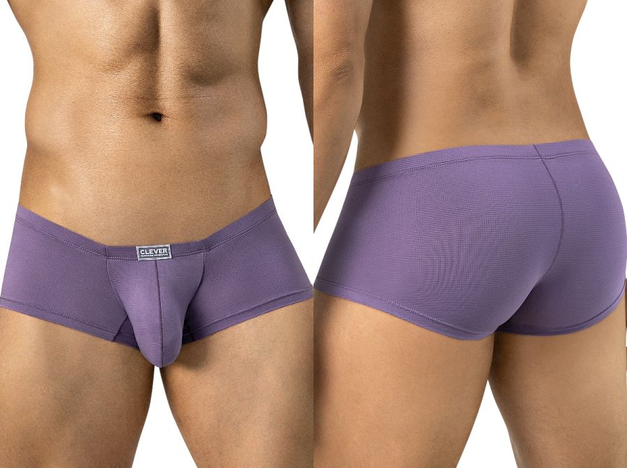 Front and rear views of a man wearing lilac textured trunks with a small branded waistband tag.