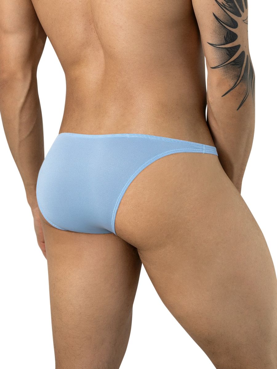 Rear view of a man wearing light blue brief-style underwear with thin side straps and a fine ribbed texture.