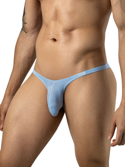 A man models light blue ribbed brief underwear with thin sides and a small logo on the waistband.