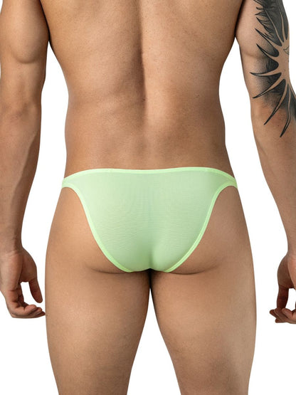 Rear view of a man wearing neon green ribbed briefs.