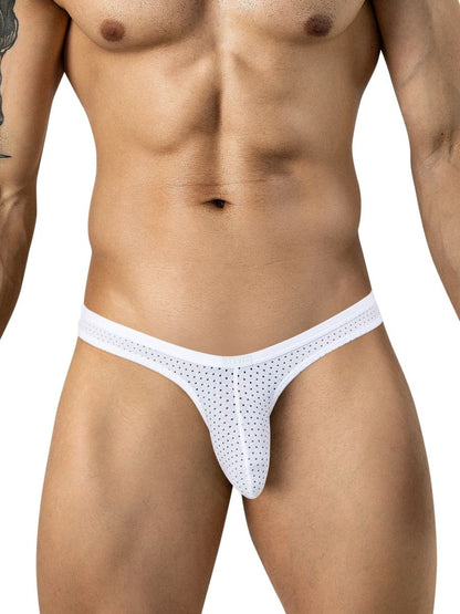 A man wears white mesh briefs featuring a low-rise fit and narrow waistband.