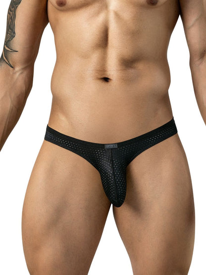 A man models black mesh briefs with thin sides and a small branded tag on the waistband.