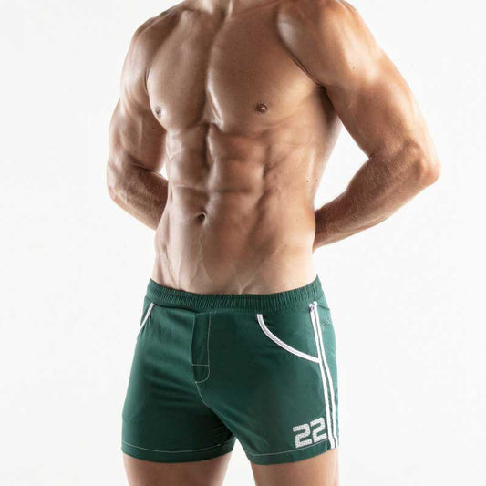 Dark green code 22 medley swim shorts with white piping and 22 logo on lower right leg size small
