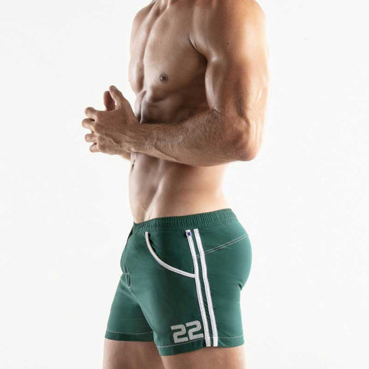 Code 22 medley shorts swimwear in dark green with white side stripes and silver number 22 on the lower left leg size s