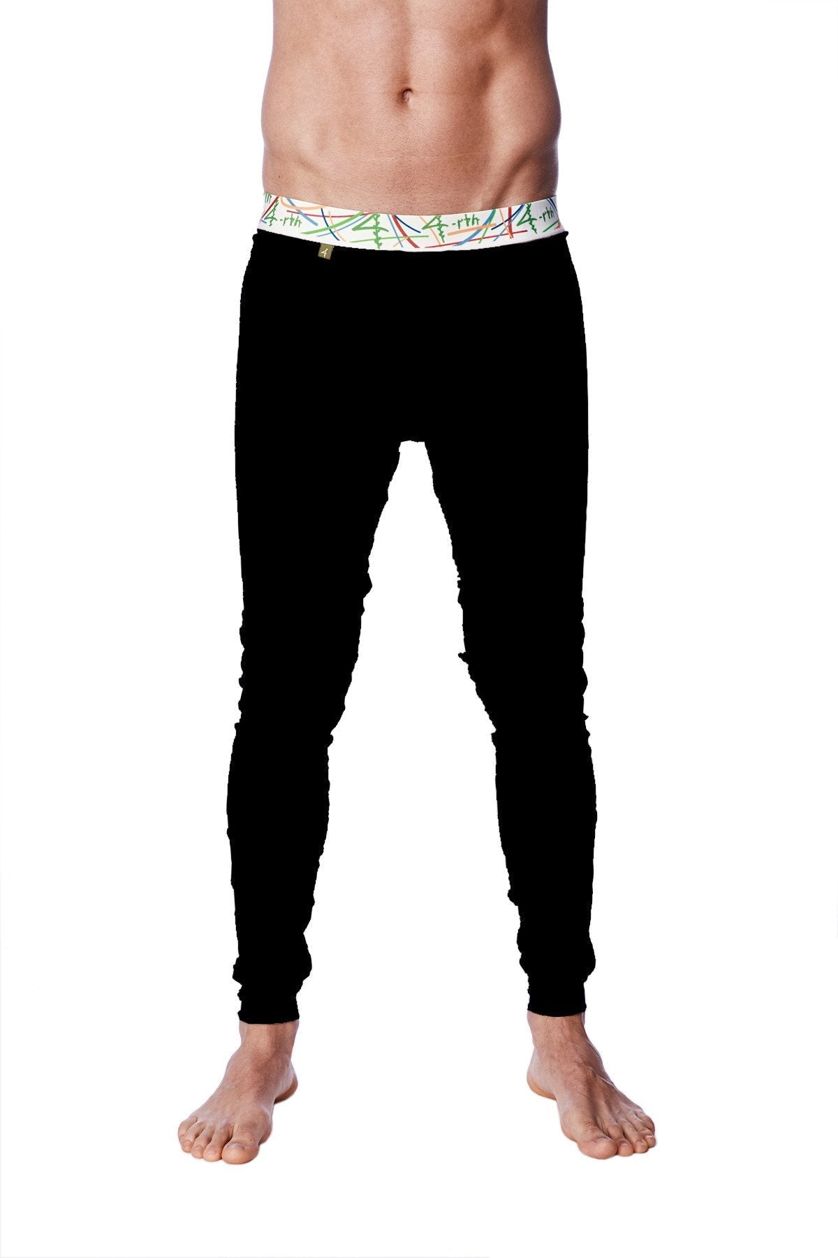 Black fitted crosstrain thermal yoga pant with a colorful abstract patterned waistband for cold weather workouts