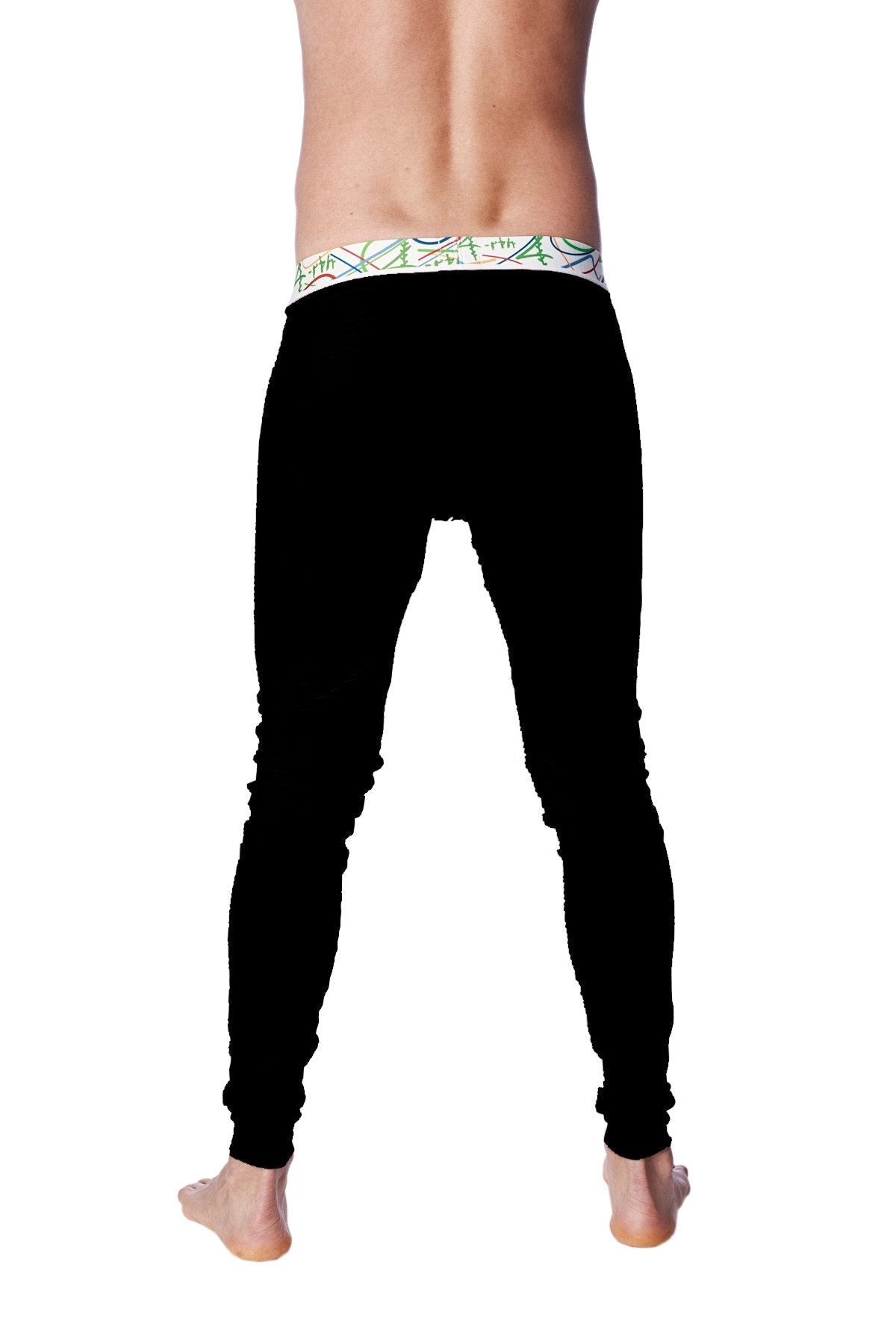 Black crosstrain thermal yoga pant with form-fitting design and green blue abstract patterned waistband
