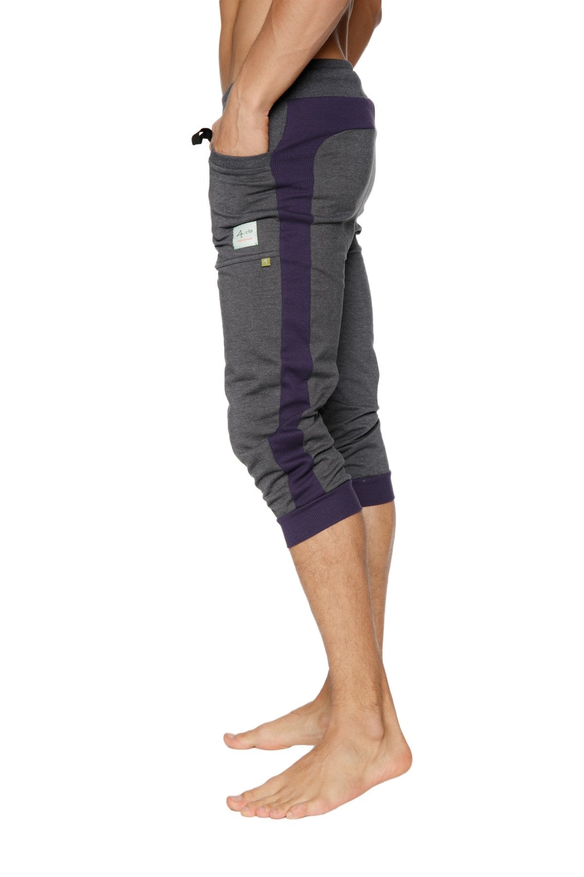 Cuffed yoga pants in charcoal with eggplant featuring a drawstring waistband side pockets and ribbed cuffs