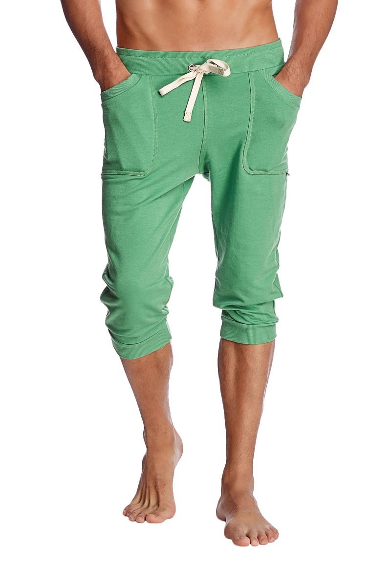 Green capri-length cuffed yoga pants with drawstring waist and side pockets made from solid bamboo fabric