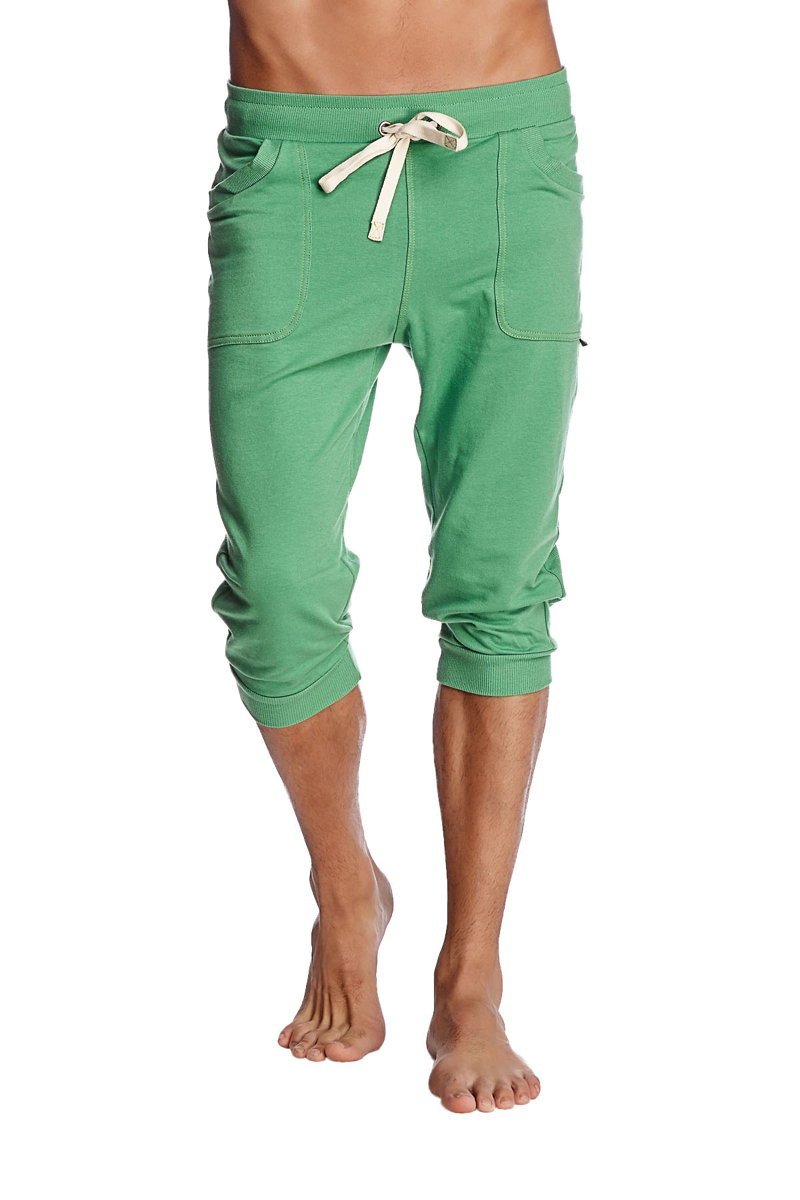 Green cuffed yoga pants made from solid bamboo fabric with capri length cream drawstring and side pockets