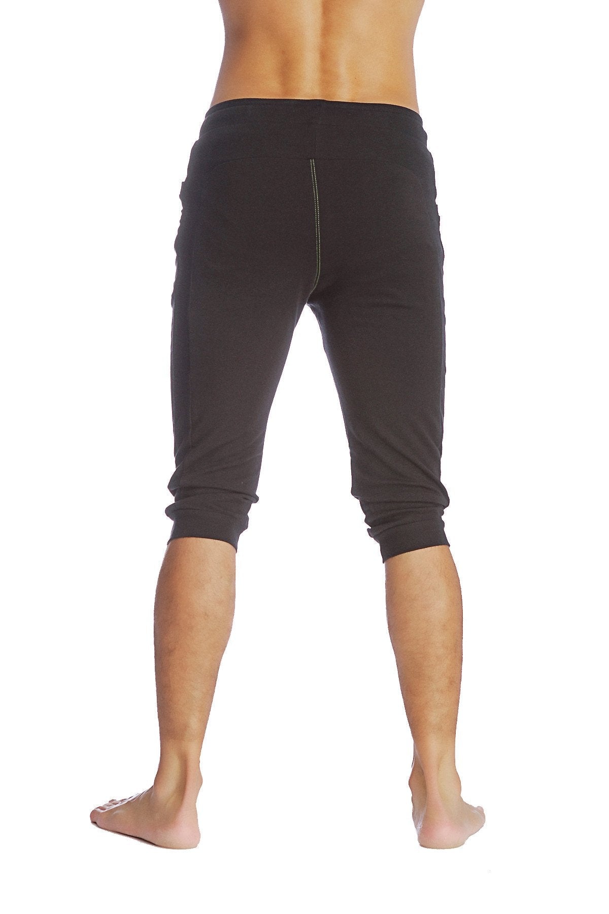 Black cuffed yoga pants with snug fit elastic waistband capri length ideal for athletic wear