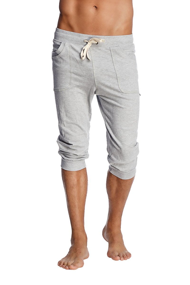 Cuffed yoga pants in solid heather grey with a drawstring waistband and side pockets made from soft fabric