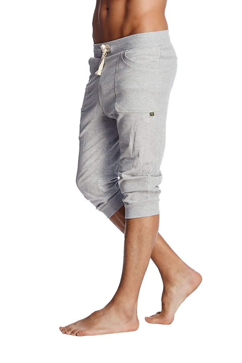 Gray heathered cotton cuffed yoga pants with drawstring waistband and rolled cuffs for comfortable wear