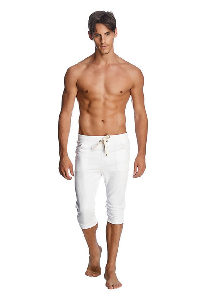 White capri-length cuffed yoga pants with a drawstring waistband for comfortable activewear