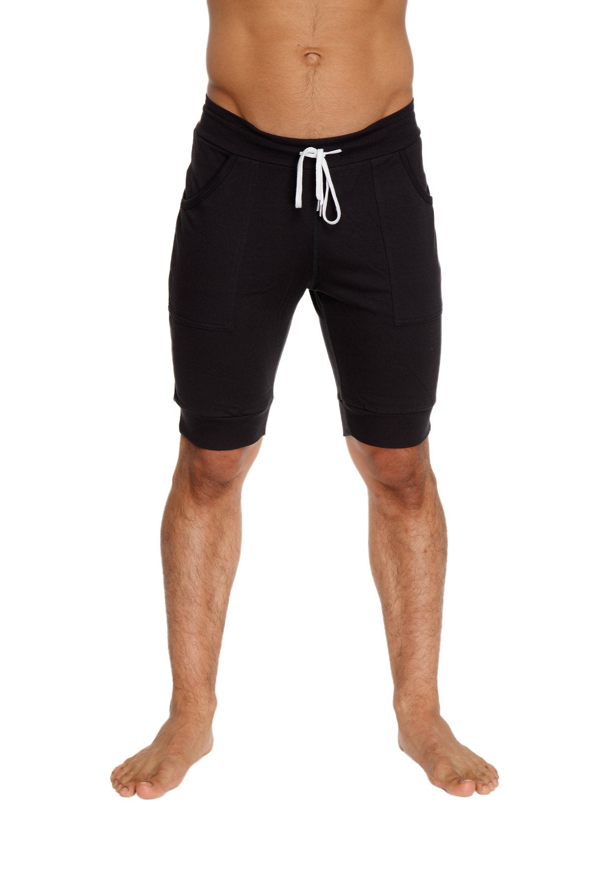 Black cuffed yoga shorts with comfortable relaxed fit and subtle side pockets for casual wear