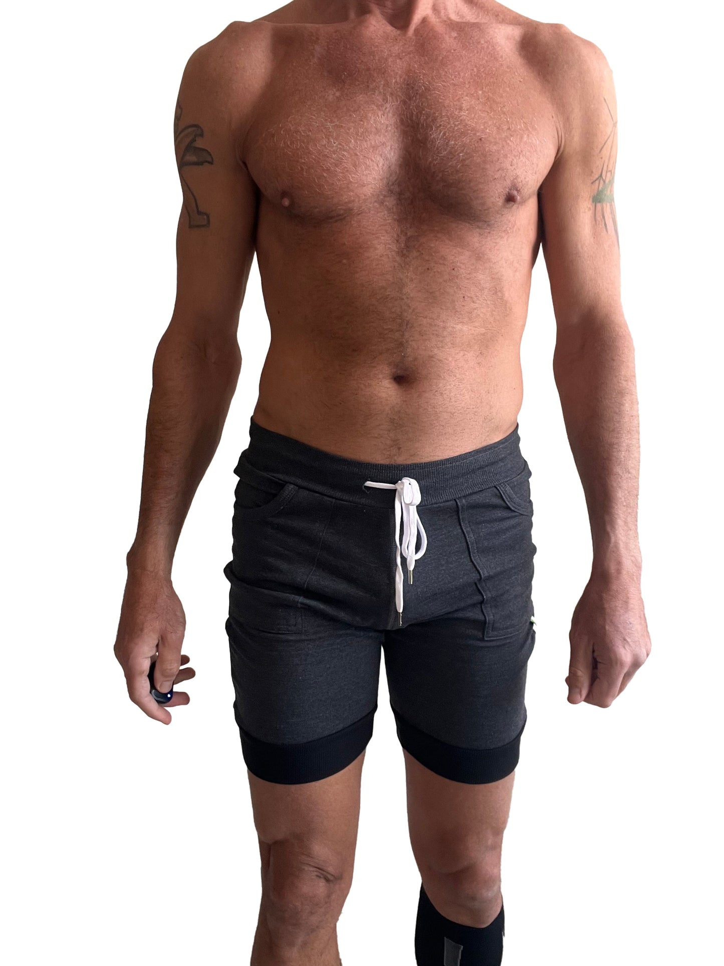 Cuffed yoga shorts in charcoal with black hem cuff and white drawstring designed for athletic use