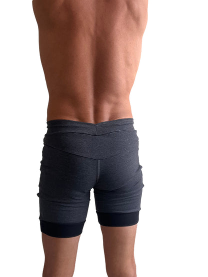 Dark gray ribbed cuffed yoga shorts with contrasting black waistband and hem in charcoal with black cuff