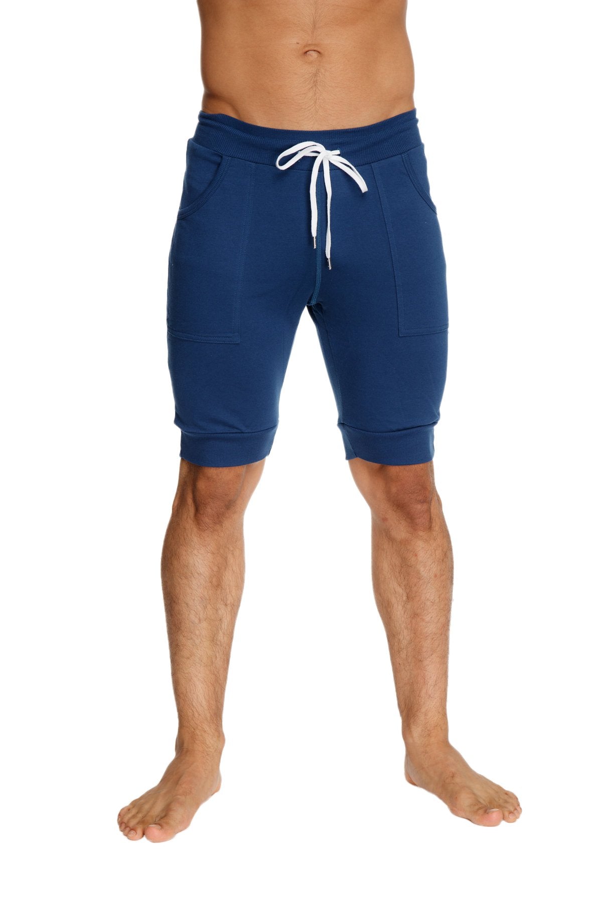 Navy blue cuffed yoga shorts with white drawstring and side pockets in jogger style for activewear