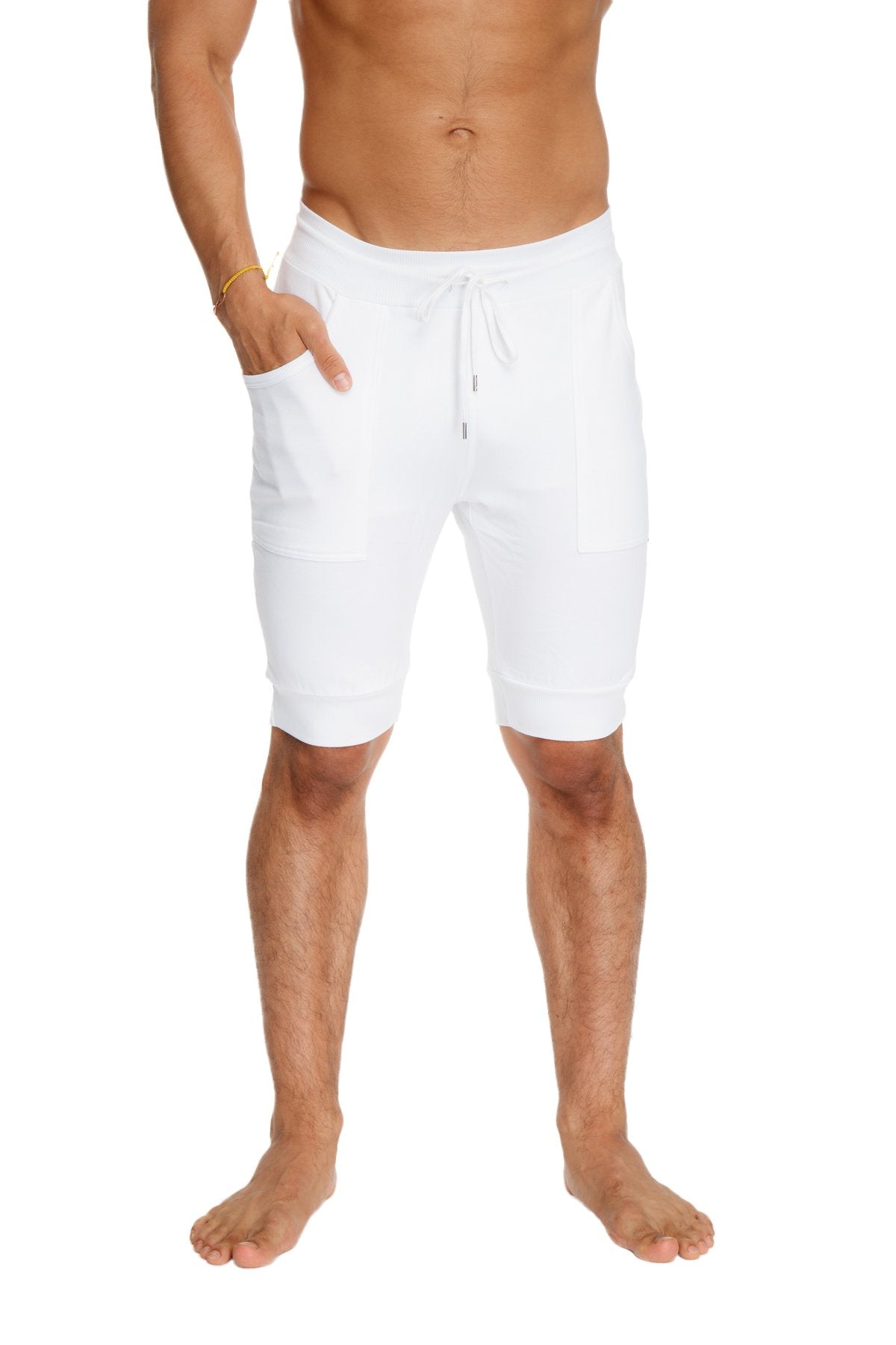 White cuffed yoga shorts with drawstring waist relaxed fit and side pockets for comfortable activewear