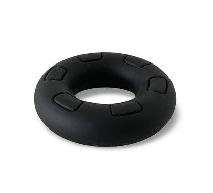 Black silicone grip ring daddy black with textured raised rectangular segments around the outer edge
