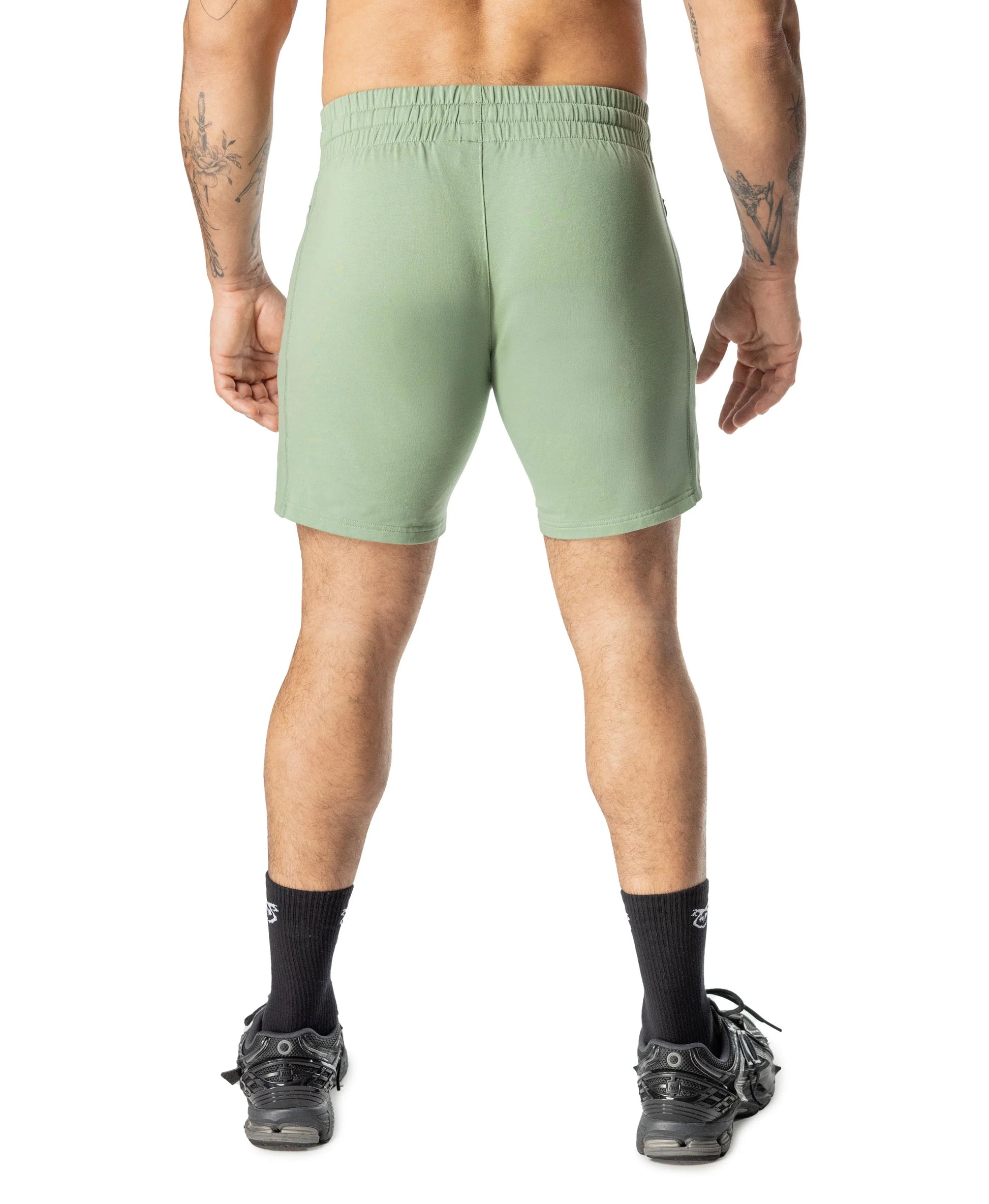 Mint green delta rugby short with elastic waistband and minimalist design ideal for athletic use