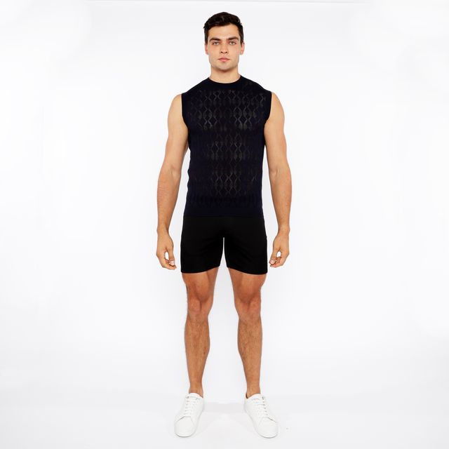 Black sleeveless diamond pointelle knit vest with intricate geometric pattern made of breathable knit fabric