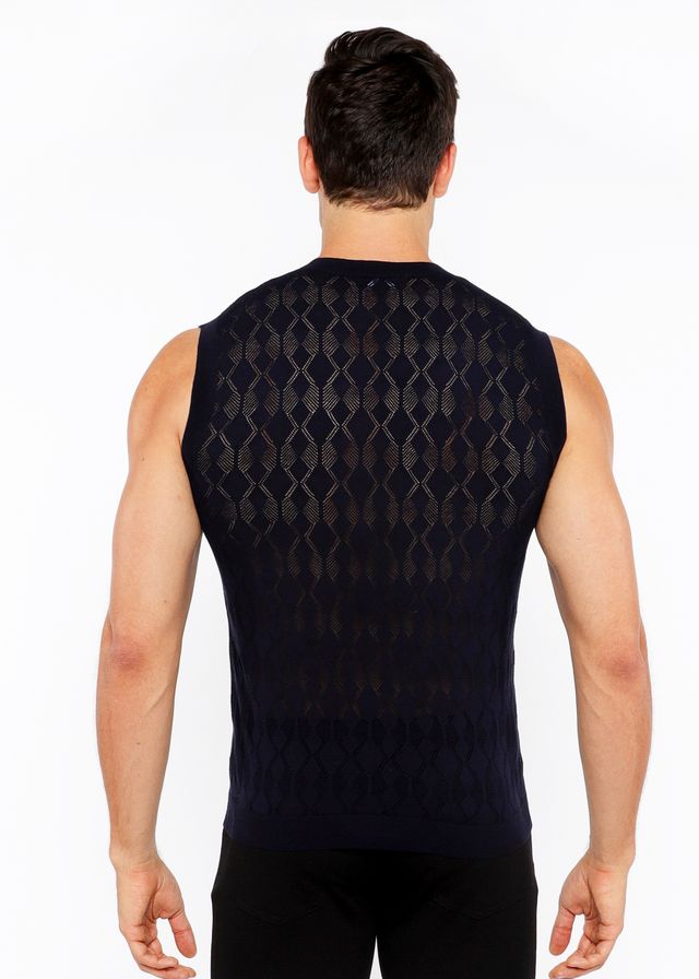 Black sleeveless diamond pointelle knit vest showing textured diamond pattern across the back side