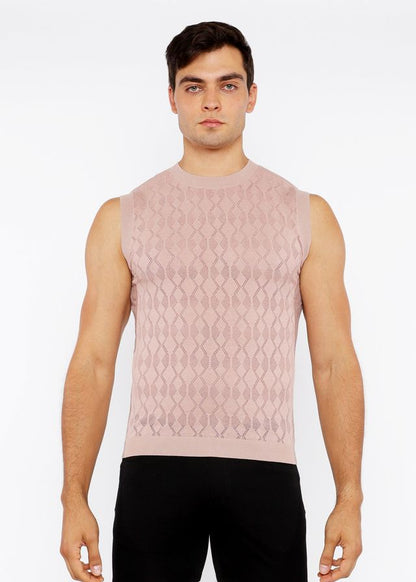 A soft pink sleeveless knit vest with subtle diamond pointelle texture perfect for layering and casual wear