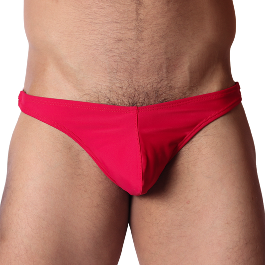 Front view of Gigo Dinamic red swim G-string in smooth, stretchy fabric with a center-seam pouch design.