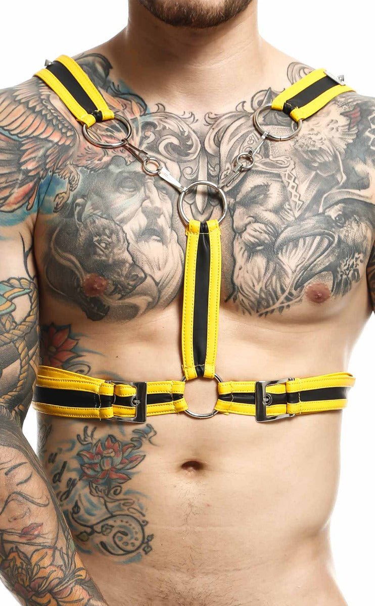 Dngeon cross chain harness made of bright yellow and black striped leather with metal rings and buckles