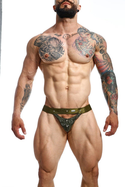 Olive green textured DNGEON peekaboo jockstrap camo briefs with metallic silver studs and a small white brand tag